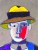 Visage de l'homme au chapeau.